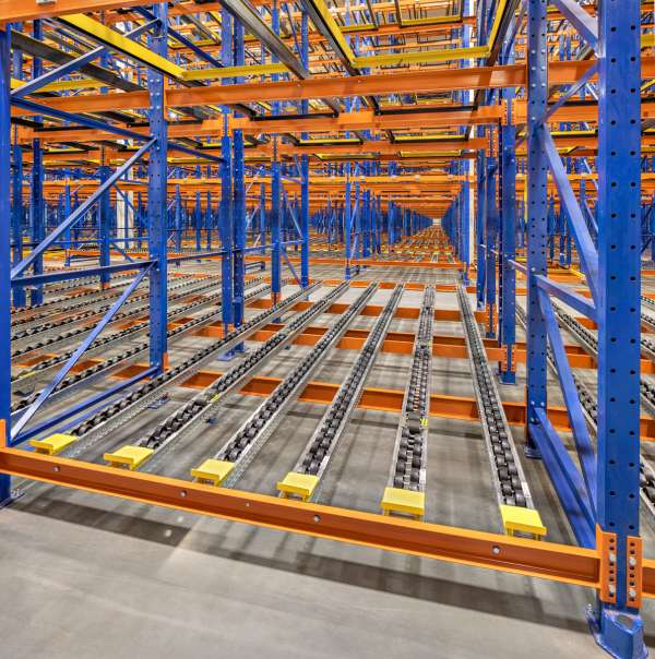 Pallet Flow Rack loaded with pallets in a warehouse